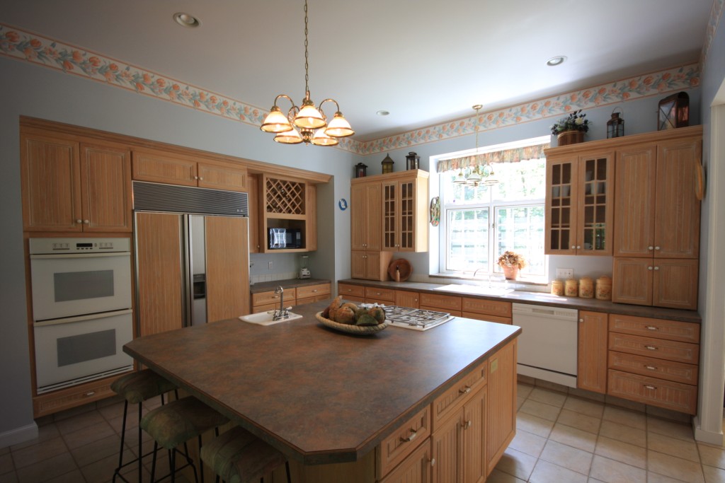 Kitchen Island Installation and Layout - A installation with drawers for pots and pans and setting