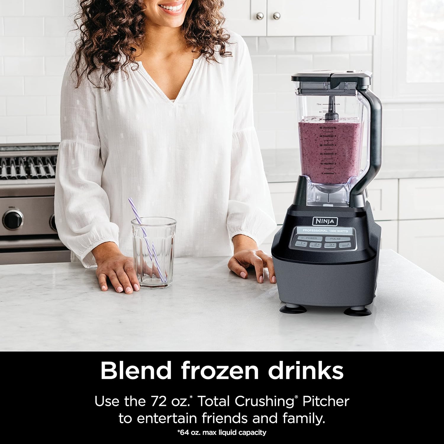 A person in a white shirt with Ninja Blender