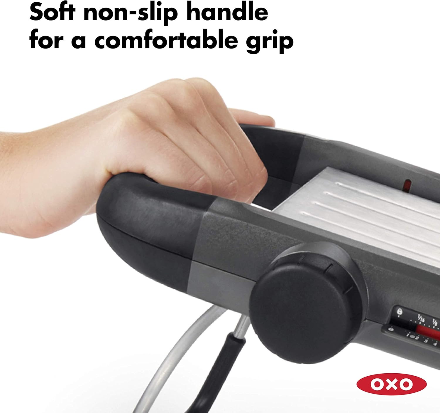 A hand holding a device  Description automatically generated