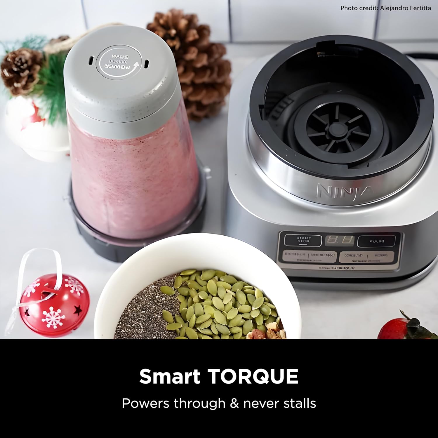A blender and bowl of seeds  Description automatically generated